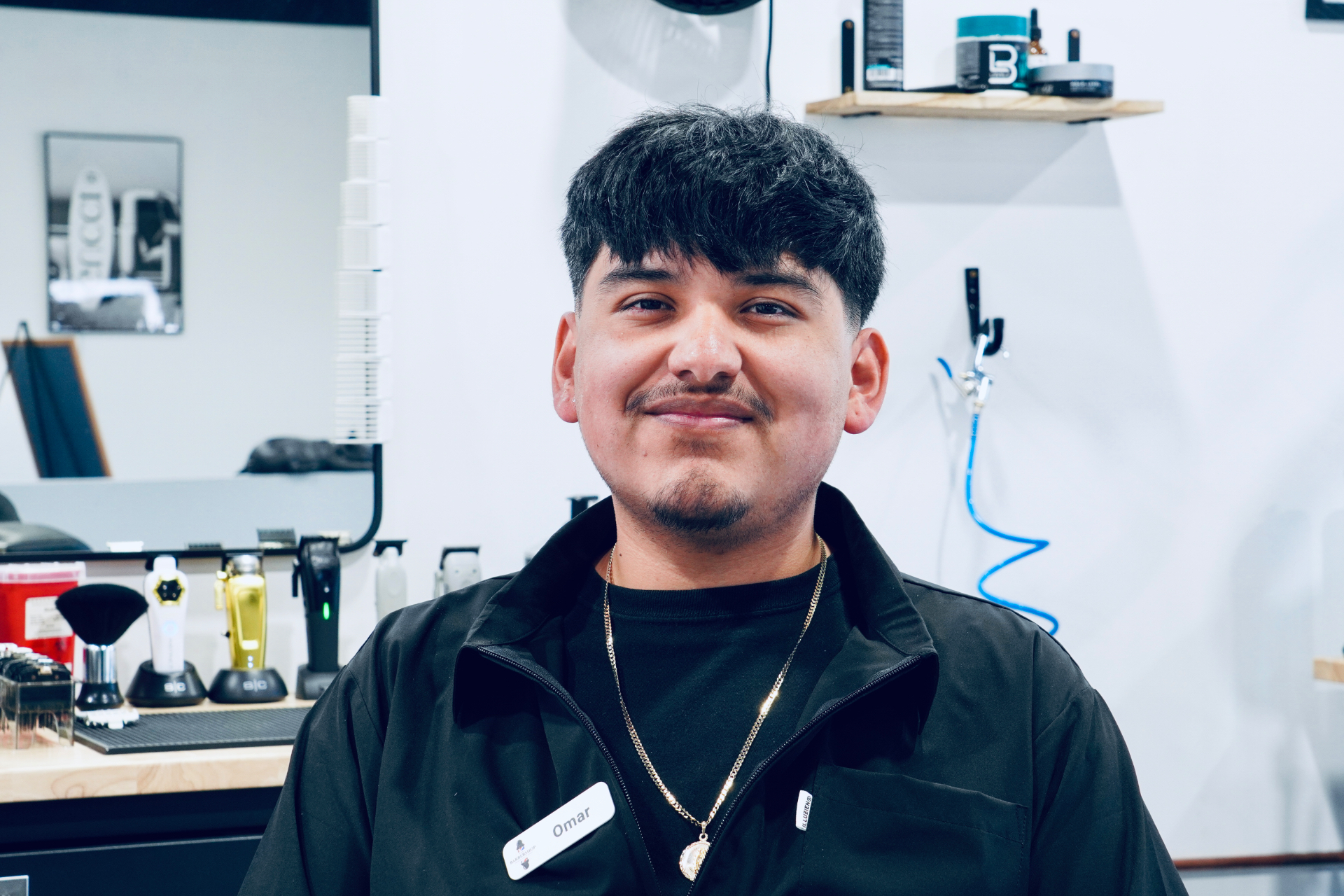 Omar P., barber at Rich's Barbershop